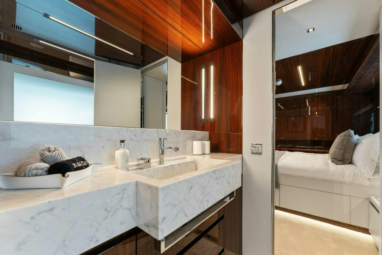 a bathroom with a large mirror aboard CHOP CHOP Yacht for Sale