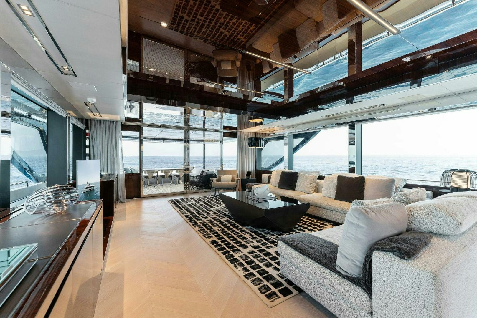 a living room with a large window aboard CHOP CHOP Yacht for Sale