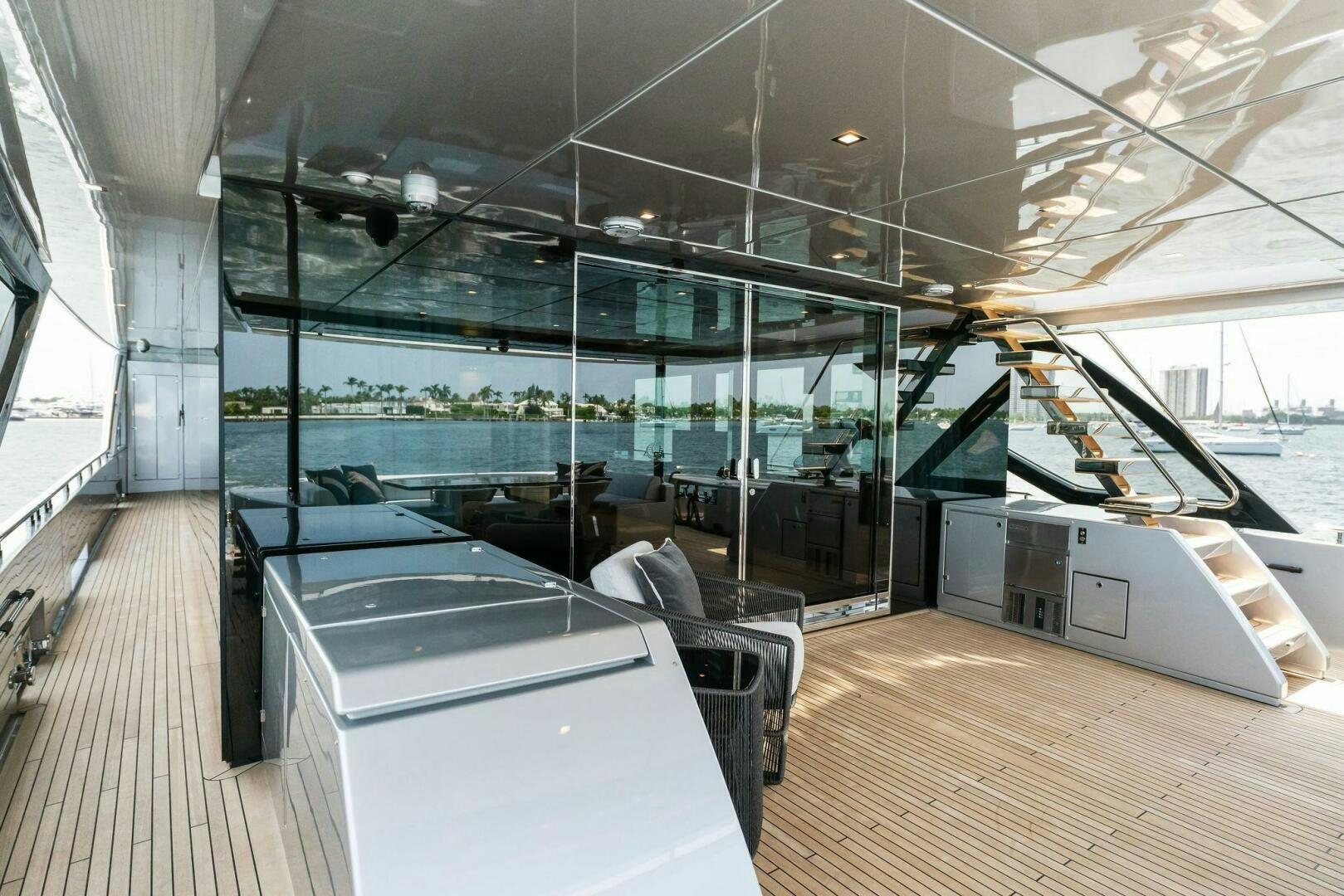 a room with a large glass wall aboard CHOP CHOP Yacht for Sale