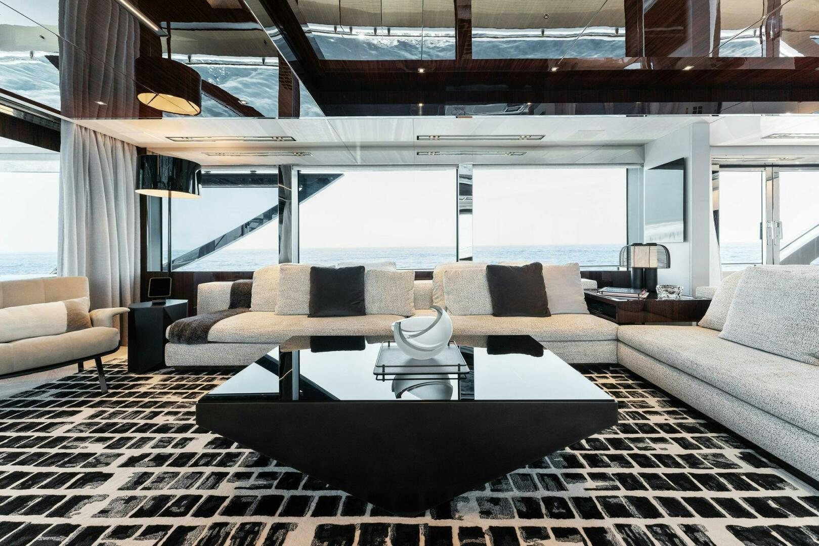 a living room with a large window aboard CHOP CHOP Yacht for Sale