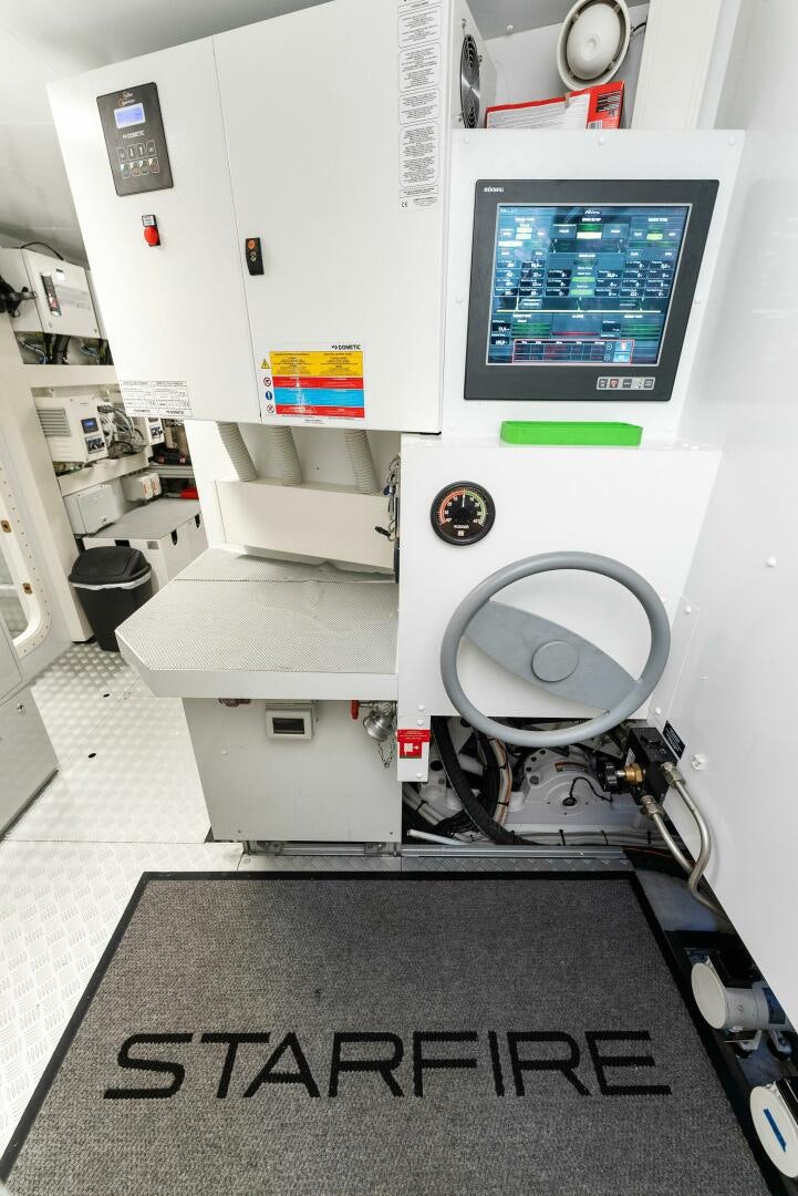 a machine with a screen aboard CHOP CHOP Yacht for Sale