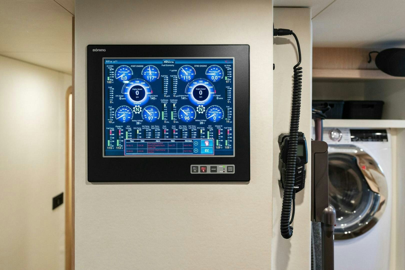 a rectangular electronic device with a screen aboard CHOP CHOP Yacht for Sale