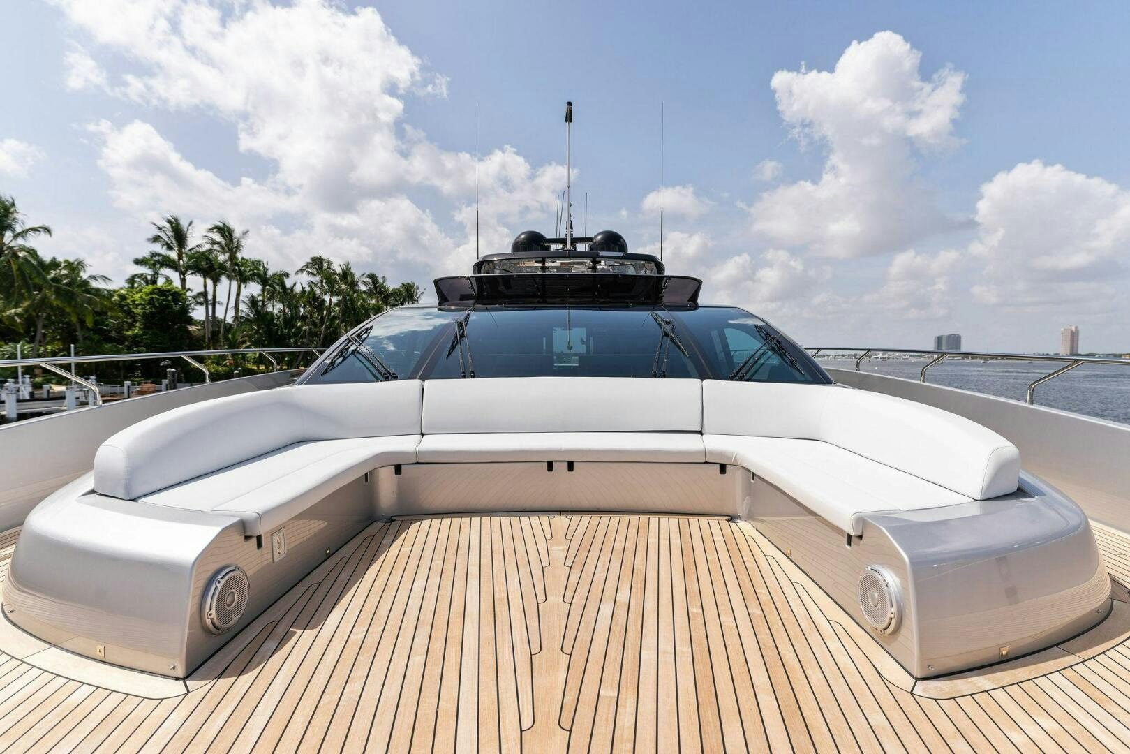 a white car parked on a wooden deck aboard CHOP CHOP Yacht for Sale