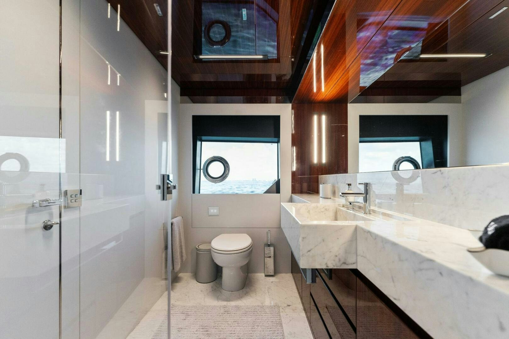 a bathroom with a sink and a toilet aboard CHOP CHOP Yacht for Sale