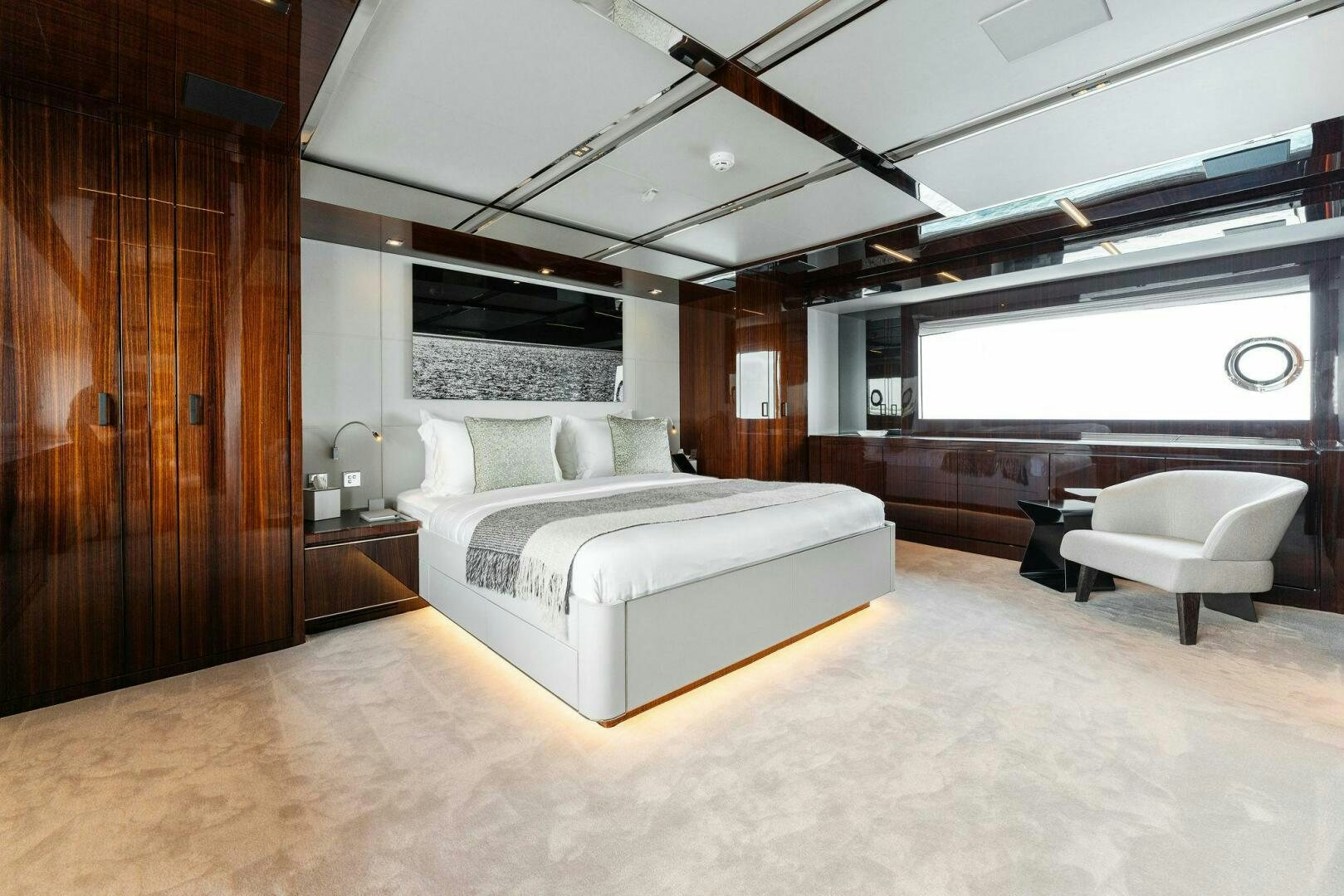 a large bedroom with a large bed aboard CHOP CHOP Yacht for Sale