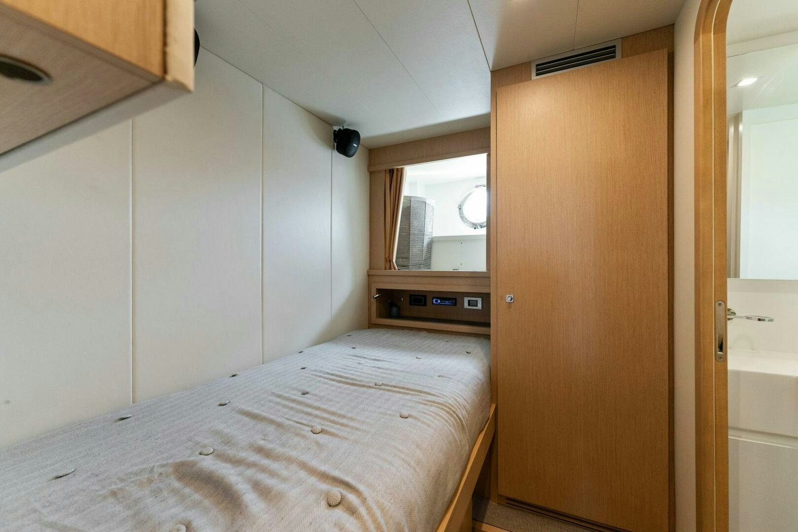 a bed in a room aboard CHOP CHOP Yacht for Sale