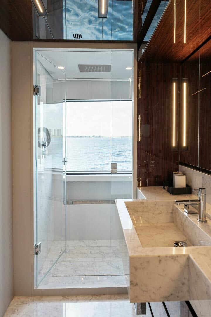 a bathroom with a large shower aboard CHOP CHOP Yacht for Sale