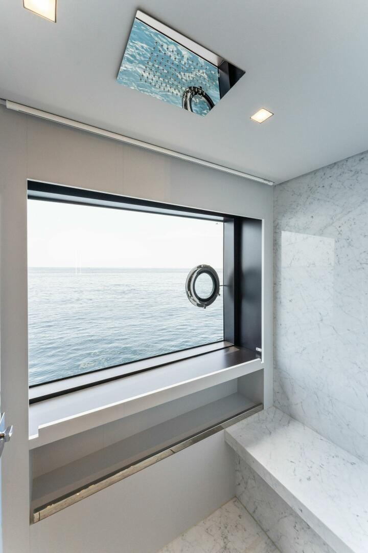 a window with a picture on it aboard CHOP CHOP Yacht for Sale