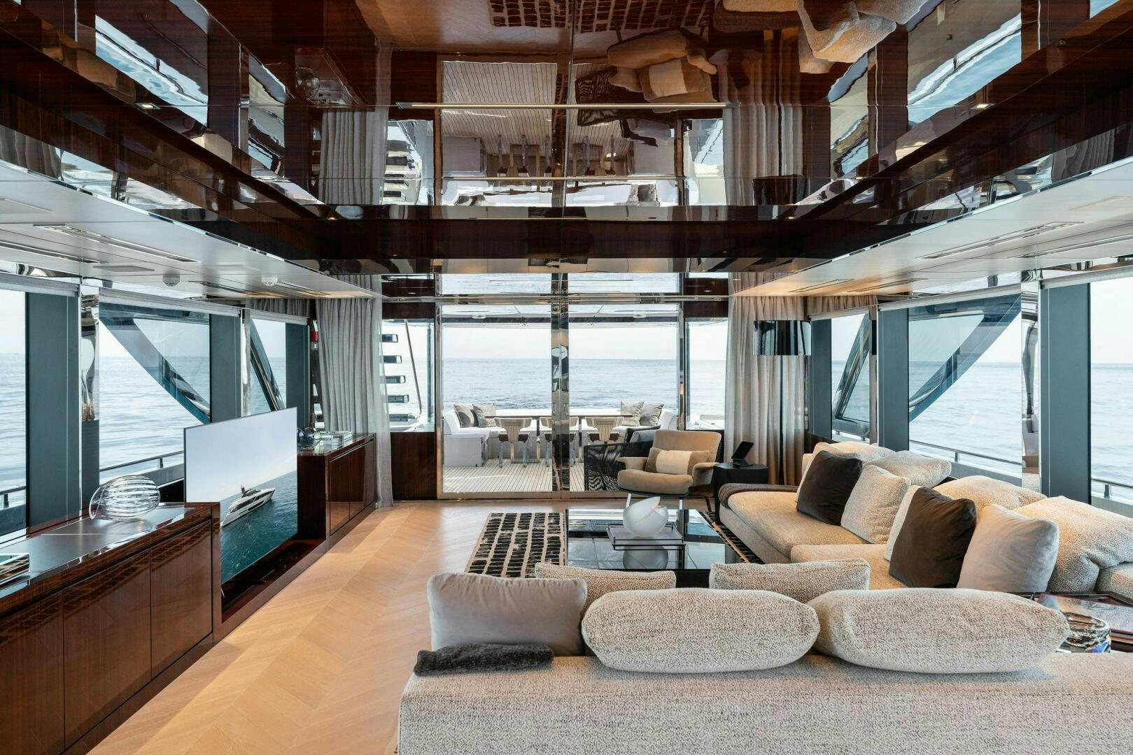 a living room with a large window aboard CHOP CHOP Yacht for Sale