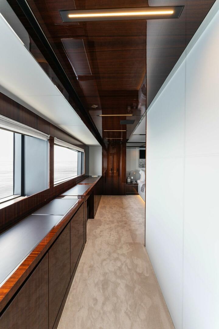 a long hallway with a wood ceiling aboard CHOP CHOP Yacht for Sale