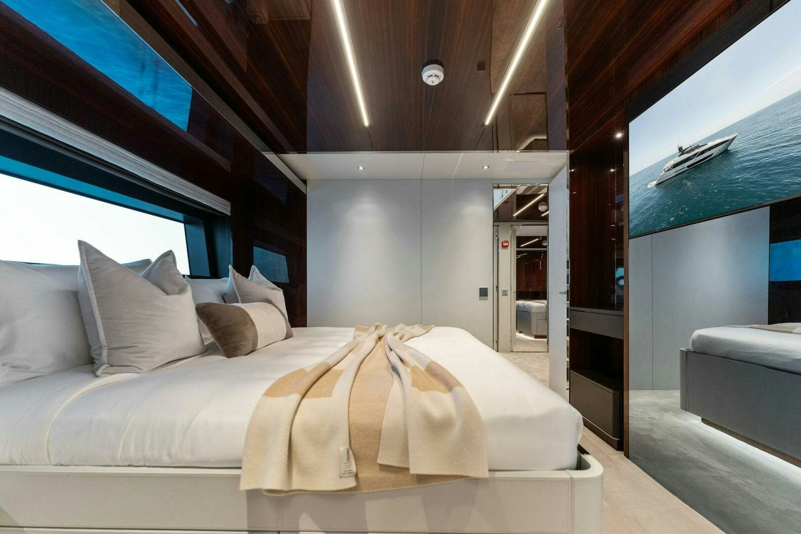 a bed with a white sheet aboard CHOP CHOP Yacht for Sale