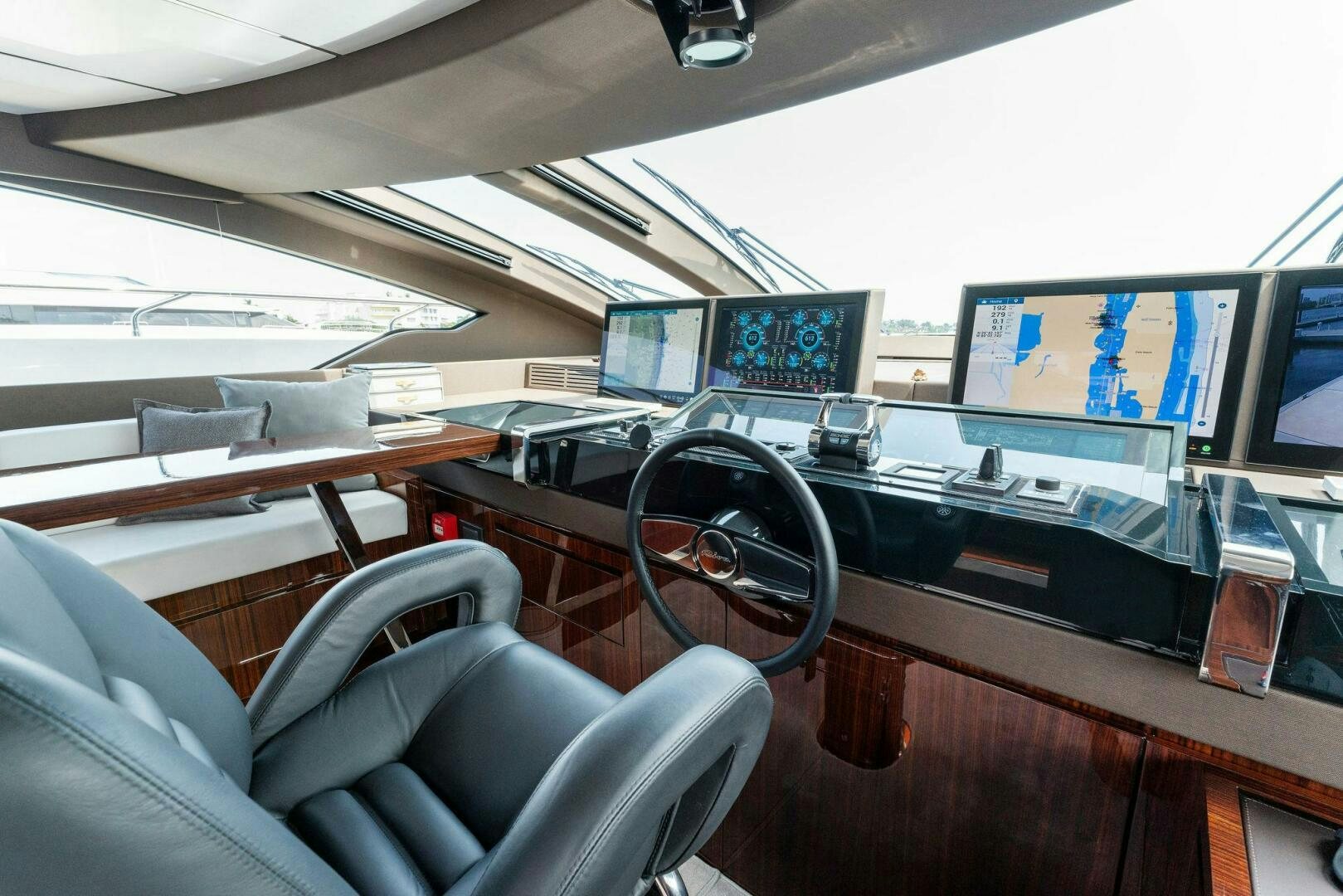 a room with computers and monitors aboard CHOP CHOP Yacht for Sale