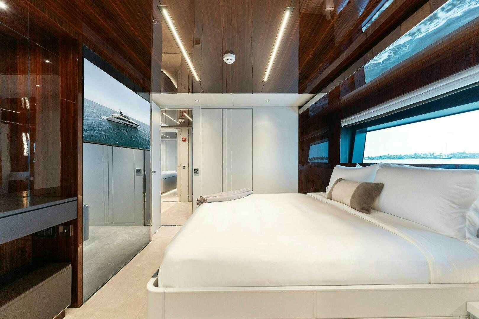 a bedroom with a large bed aboard CHOP CHOP Yacht for Sale