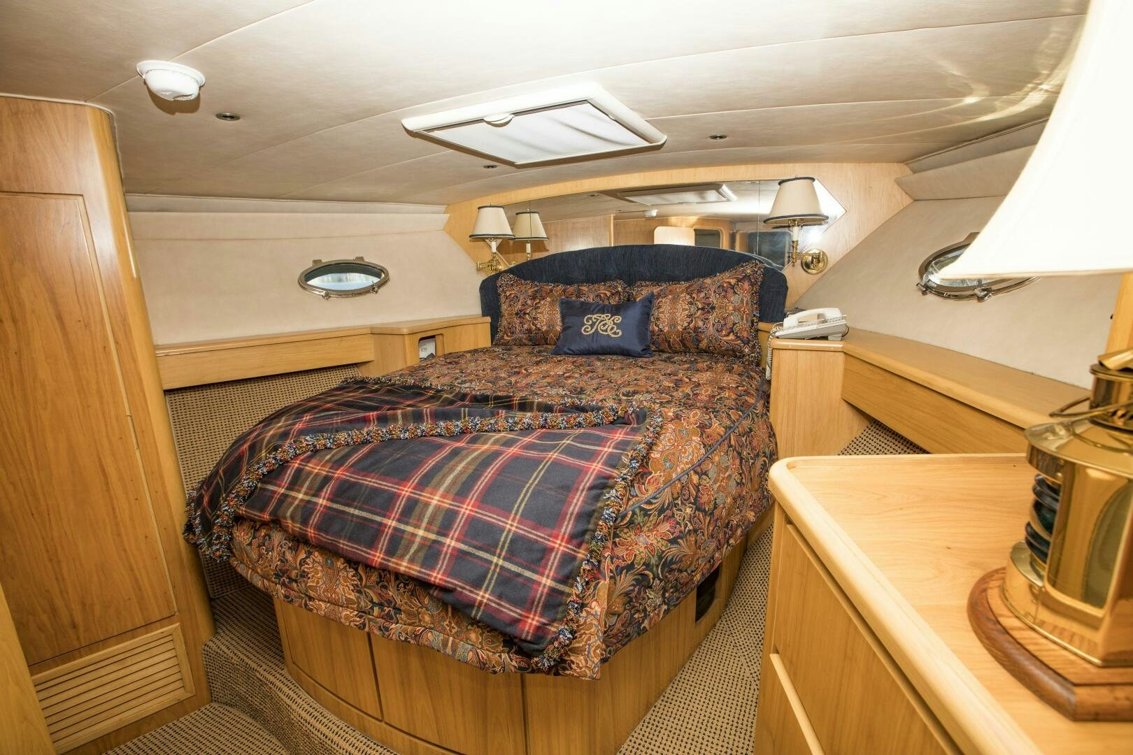 a bed in a room aboard GOOD KARMA Yacht for Sale