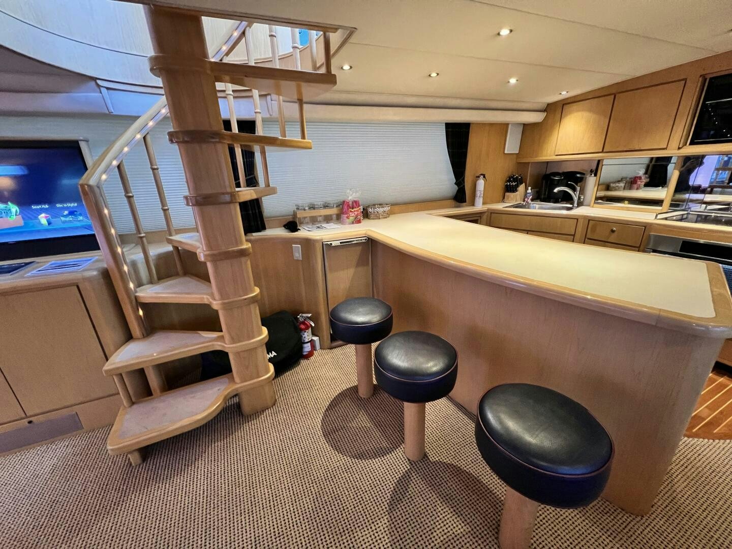 a room with a desk and a computer aboard GOOD KARMA Yacht for Sale
