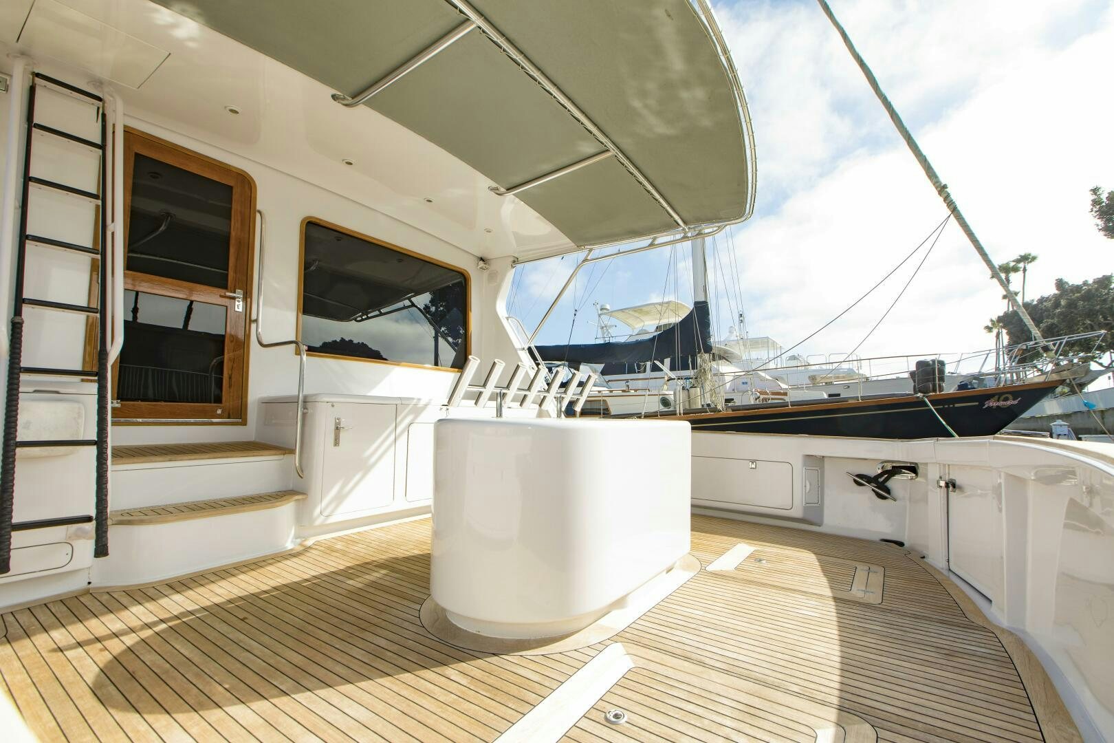a large white tub on a deck aboard GOOD KARMA Yacht for Sale