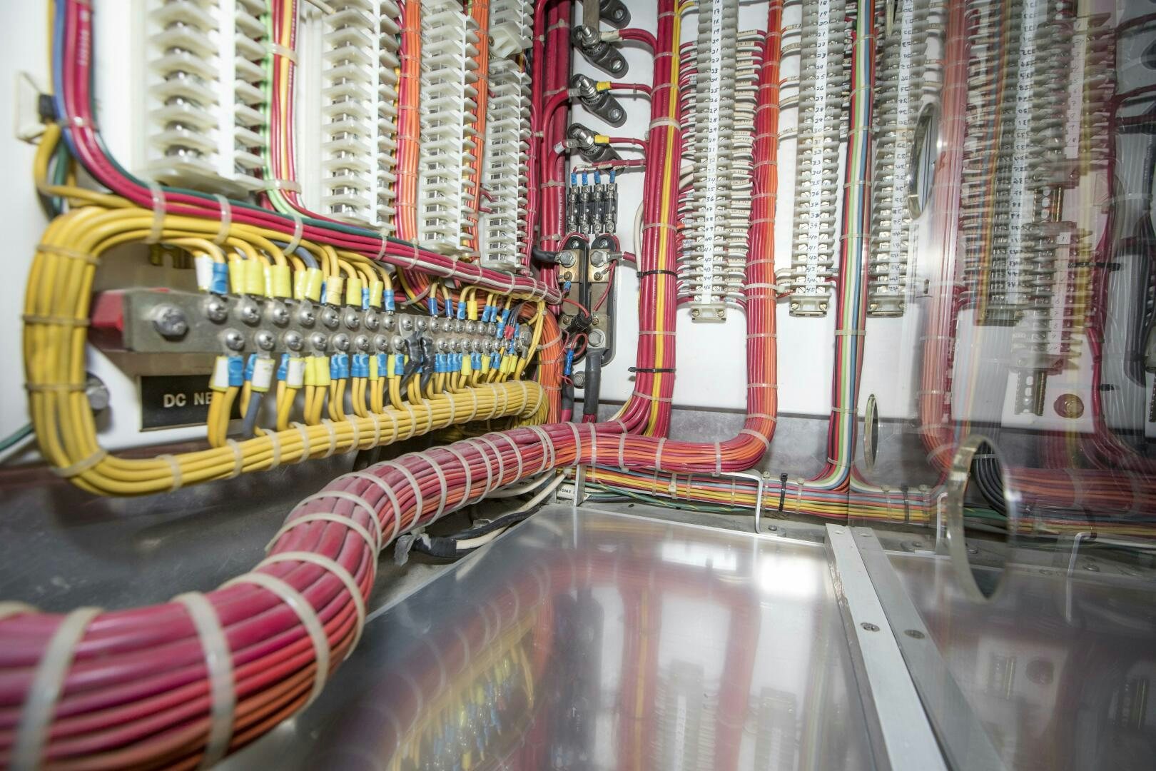 a large white and red factory aboard GOOD KARMA Yacht for Sale