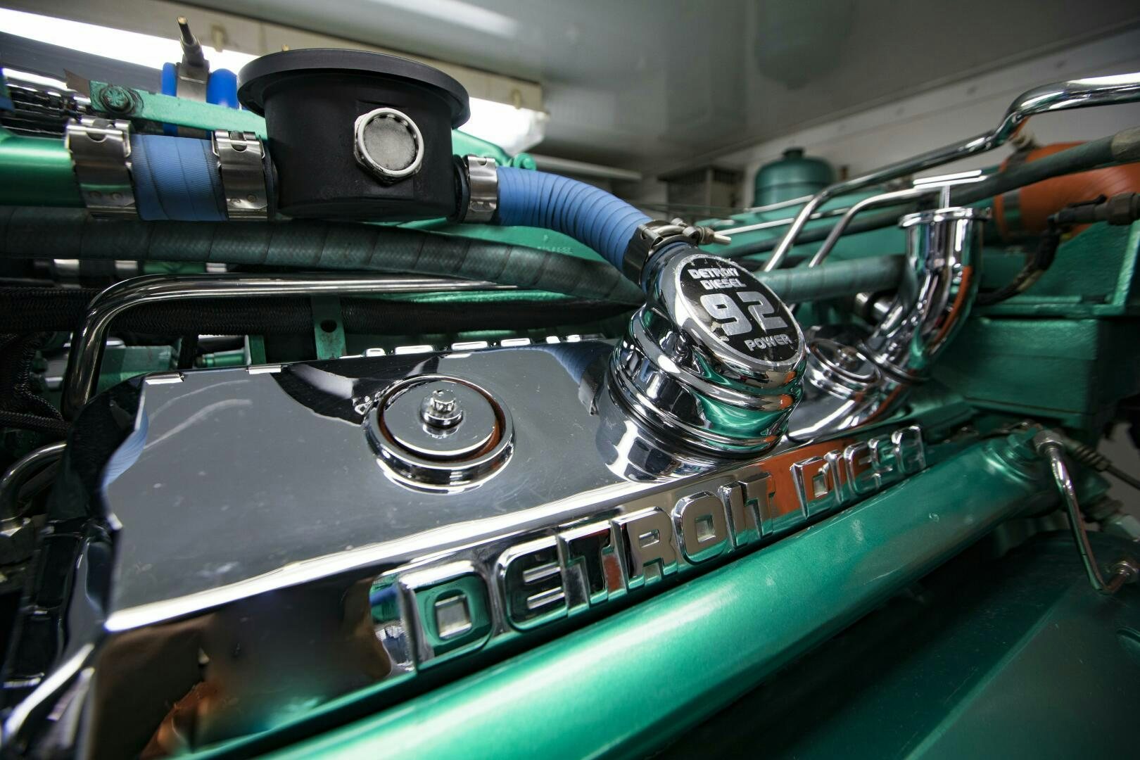 a close-up of a car engine aboard GOOD KARMA Yacht for Sale
