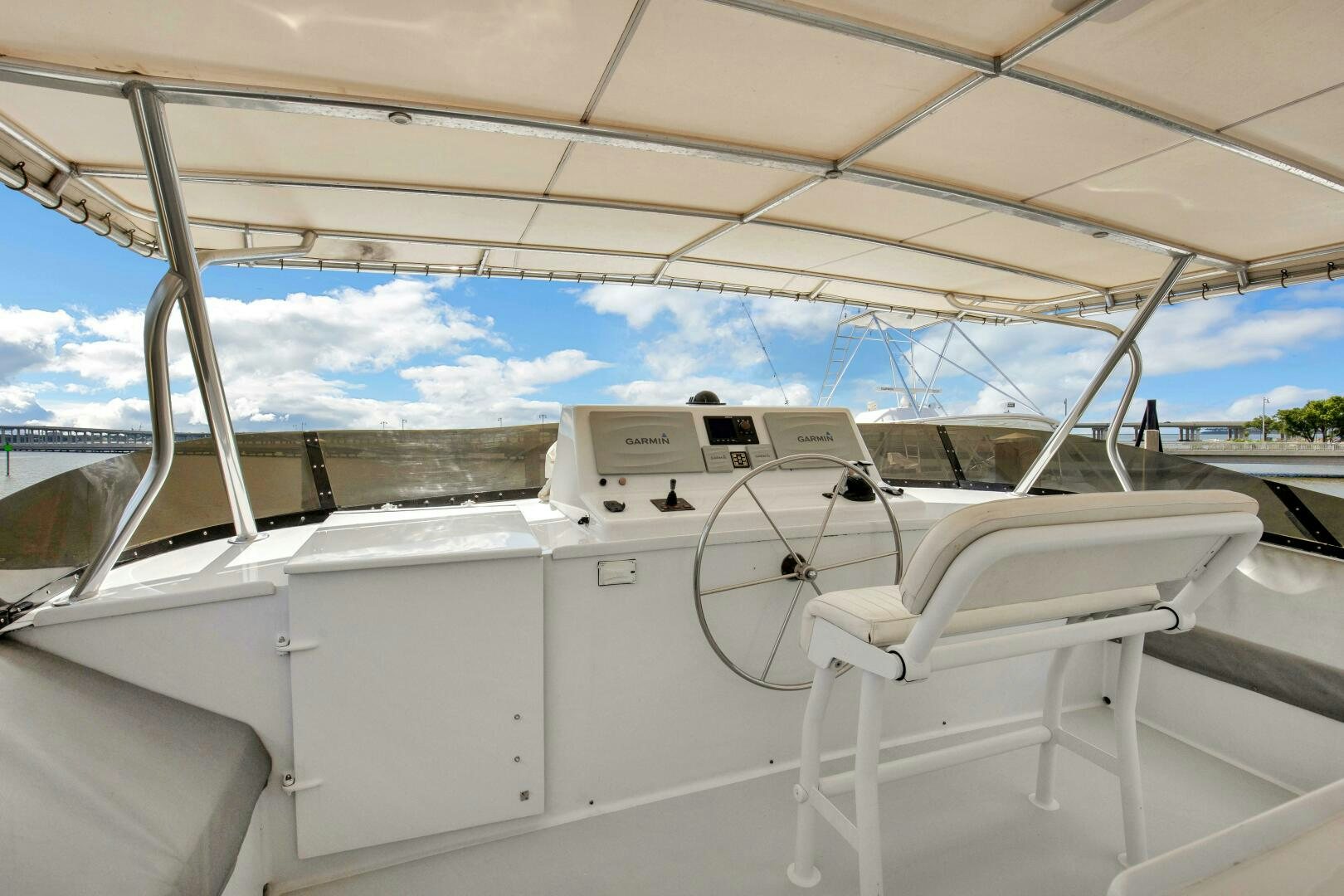 a boat with white seats aboard LADY P Yacht for Sale