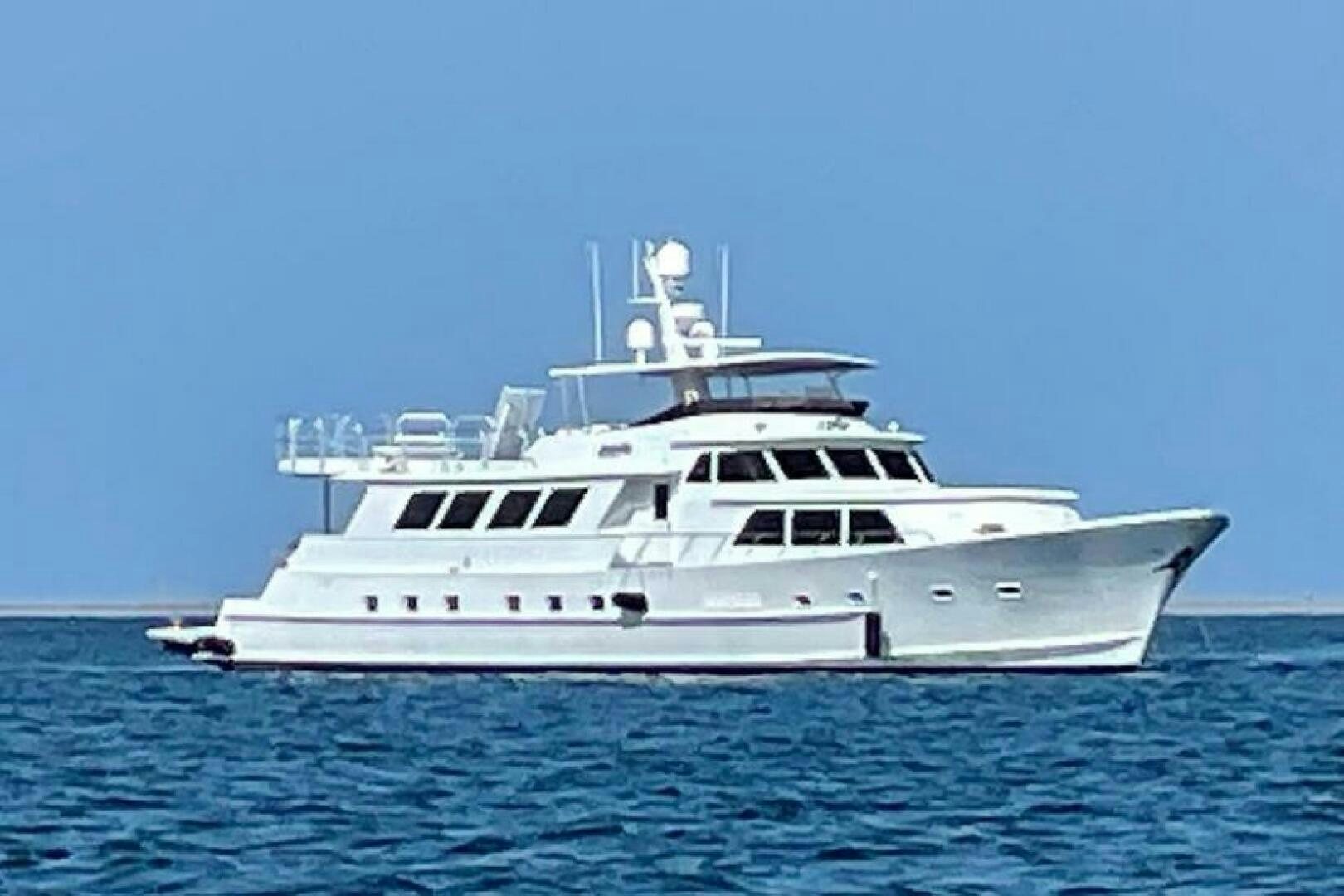 a white yacht in the water aboard LADY P Yacht for Sale