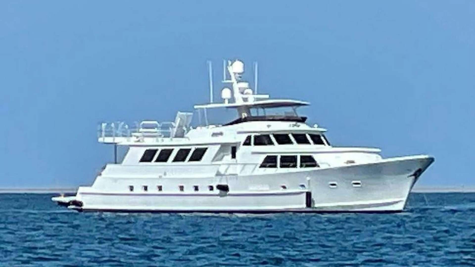 a white yacht in the water aboard LADY P Yacht for Sale