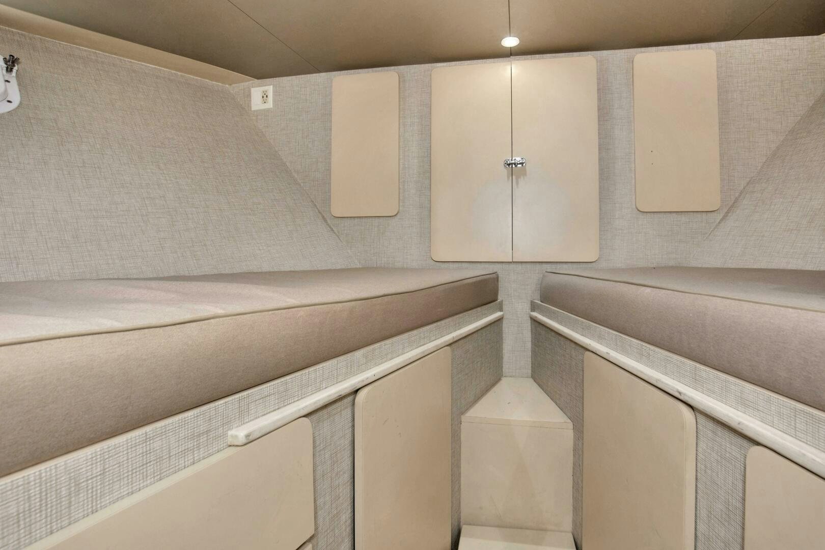 a room with white cabinets aboard LADY P Yacht for Sale