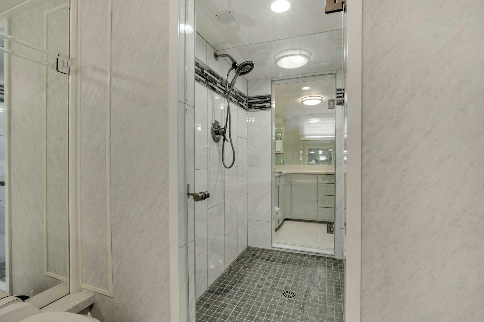 a bathroom with a shower unit aboard LADY P Yacht for Sale