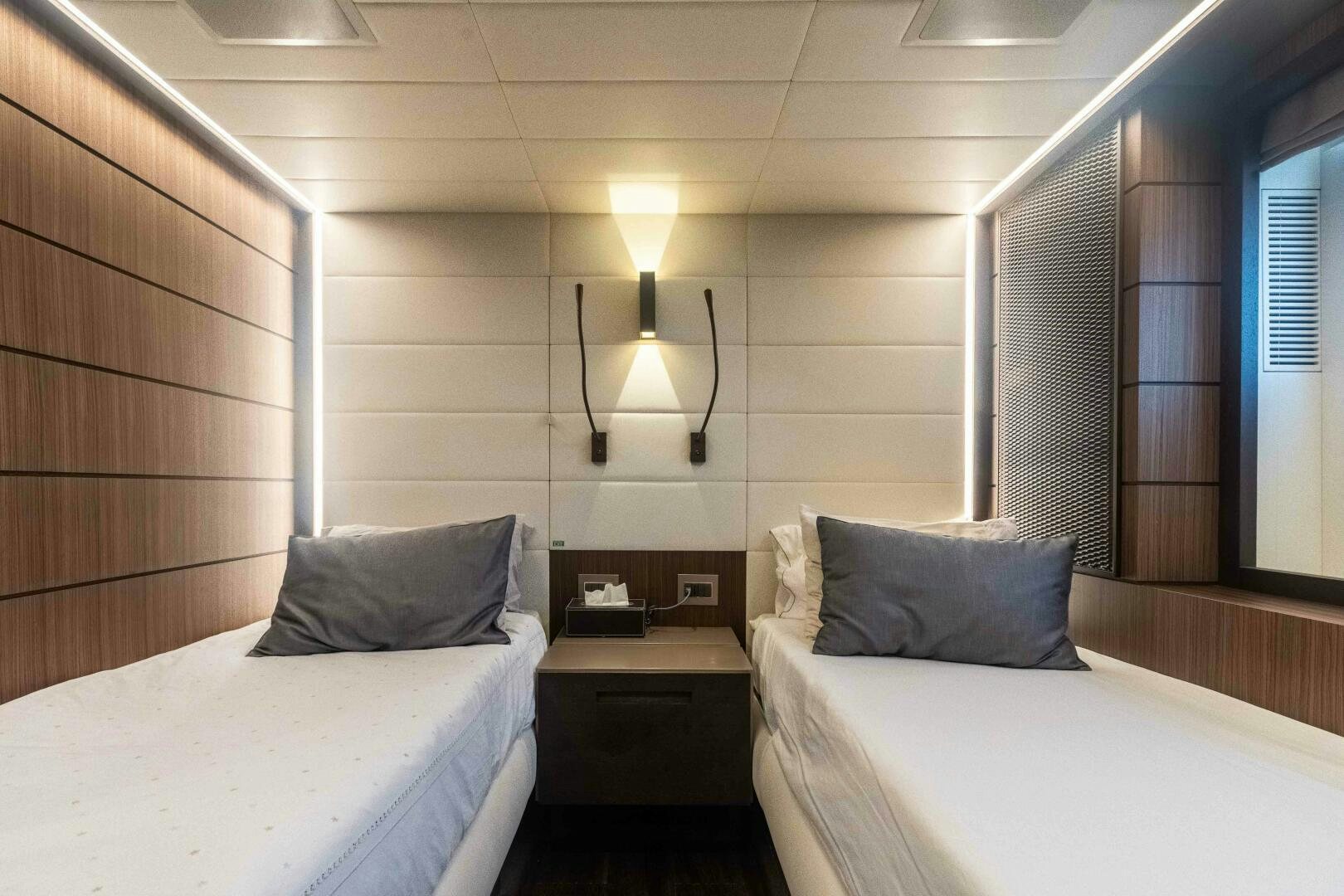 a couple of beds in a room aboard SAFAD Yacht for Sale