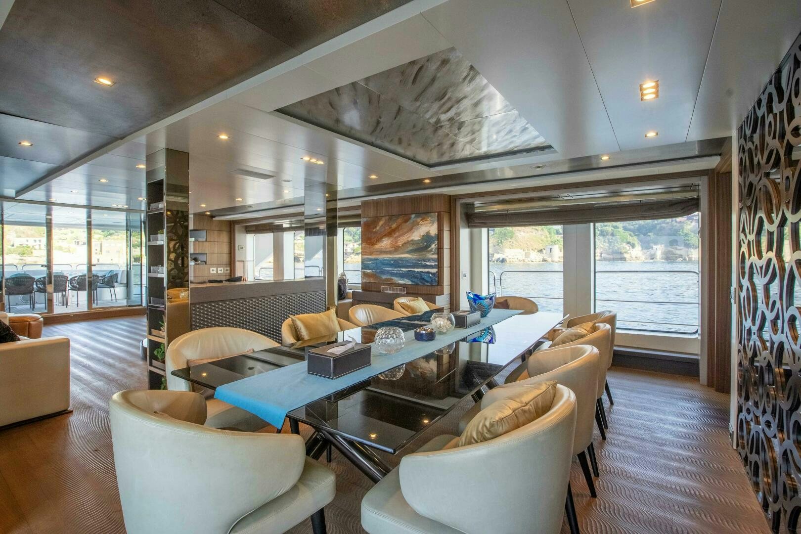 a living room with a large glass window aboard SAFAD Yacht for Sale