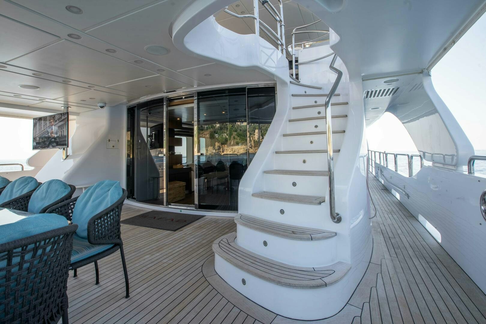 a white staircase in a room aboard SAFAD Yacht for Sale