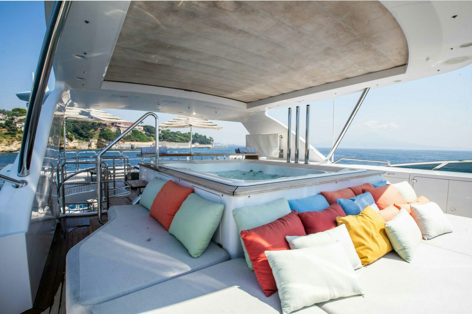 a boat with pillows on a deck aboard SAFAD Yacht for Sale