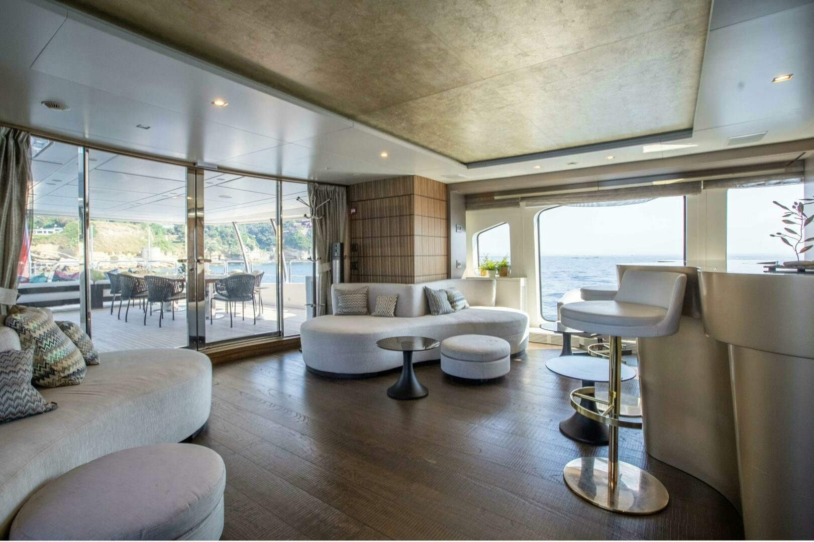 a living room with a large window aboard SAFAD Yacht for Sale