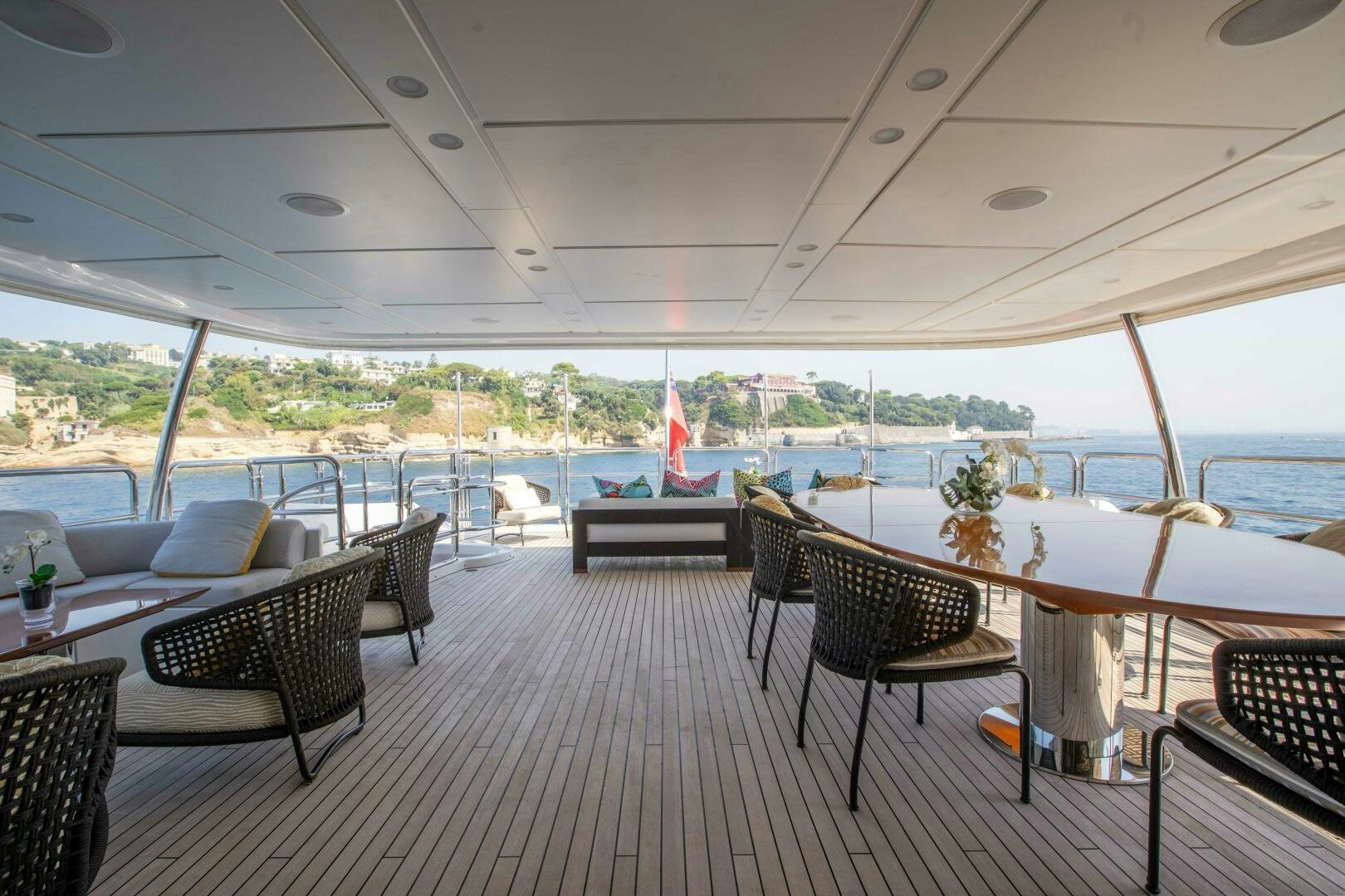 a room with a table chairs and a large window aboard SAFAD Yacht for Sale