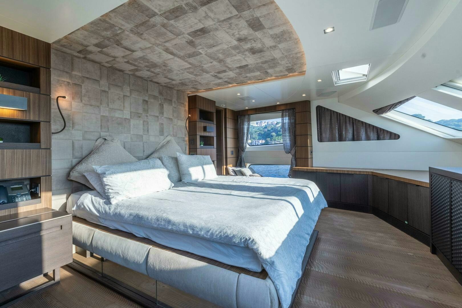 a bedroom with a large bed aboard SAFAD Yacht for Sale