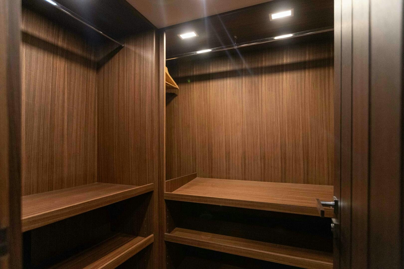 a room with wooden walls aboard SAFAD Yacht for Sale