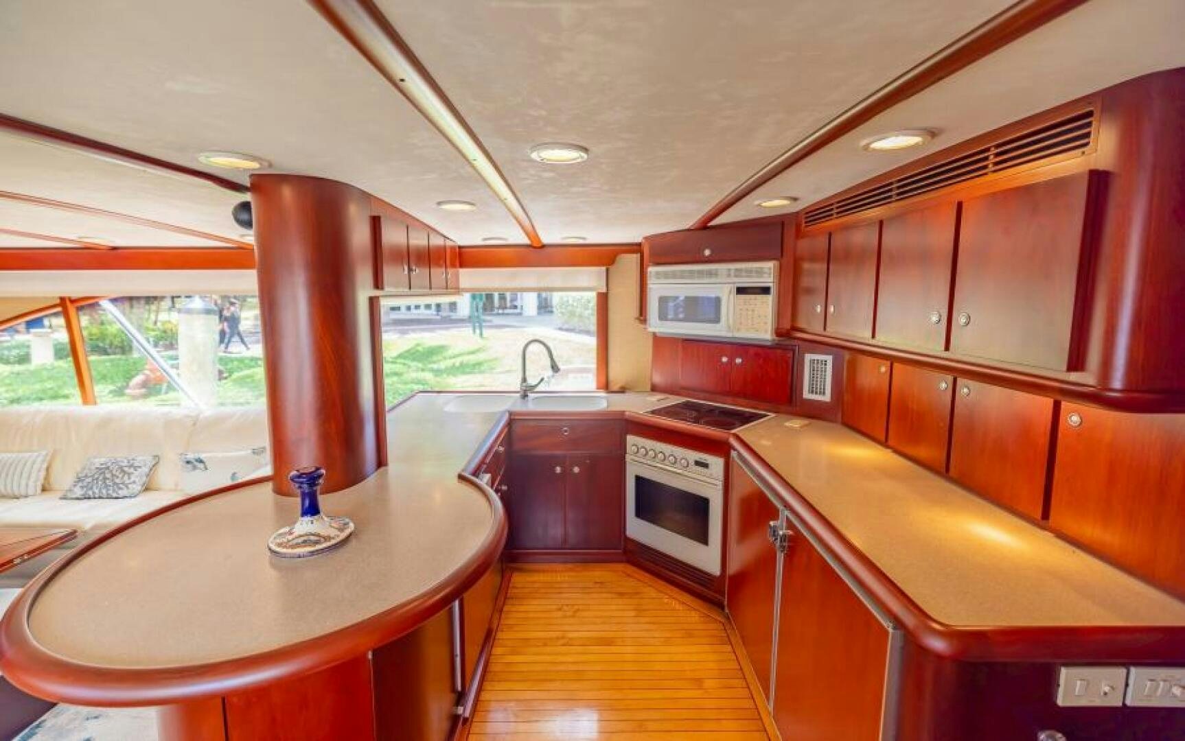 a kitchen with a large island aboard BOOMER Yacht for Sale