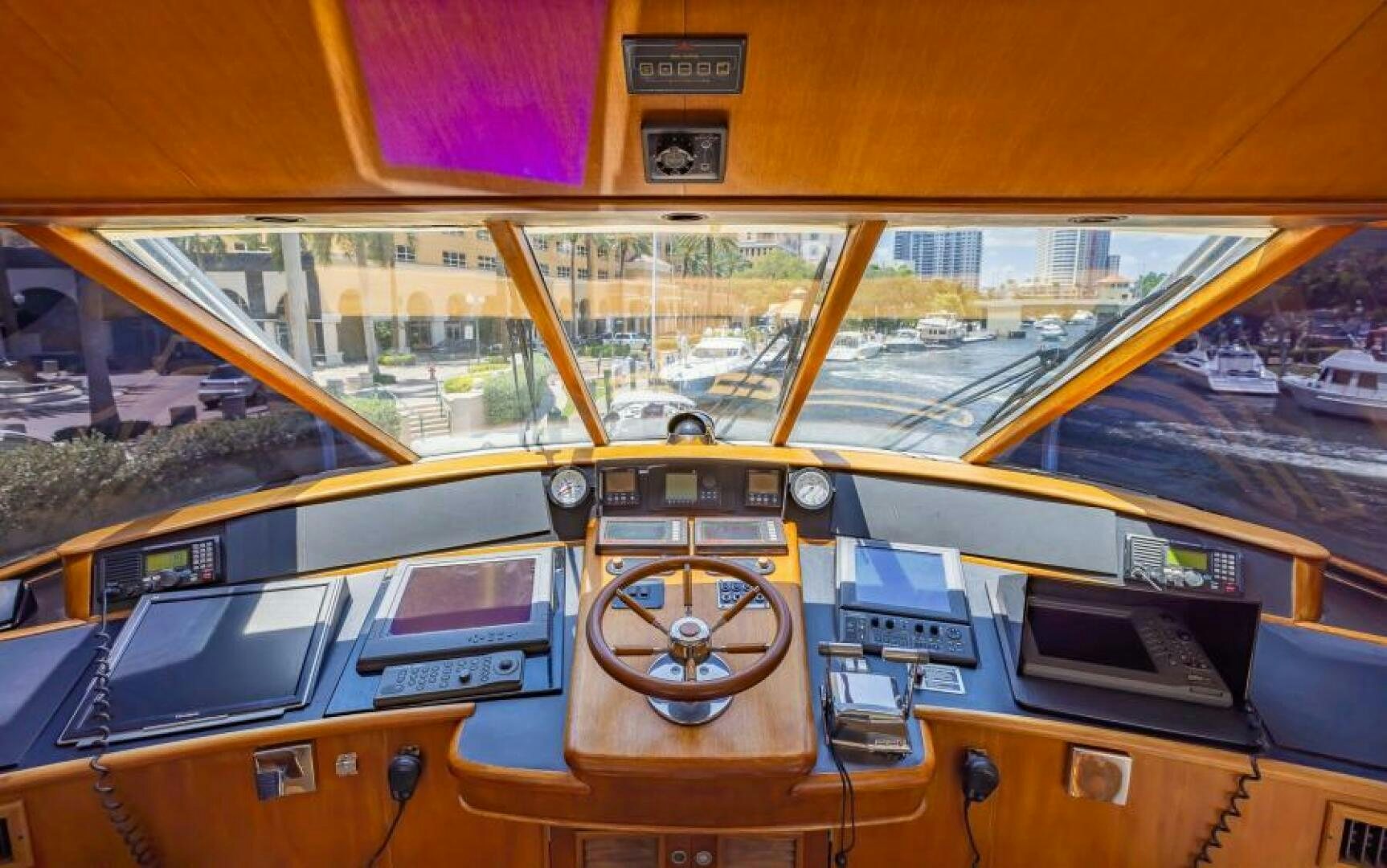 inside of a yellow vehicle aboard BOOMER Yacht for Sale