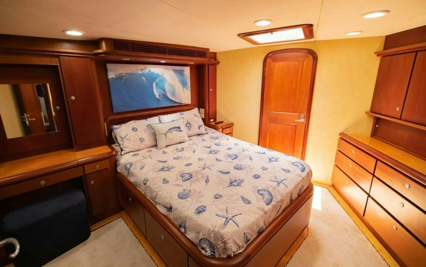 a bed in a room aboard BOOMER Yacht for Sale