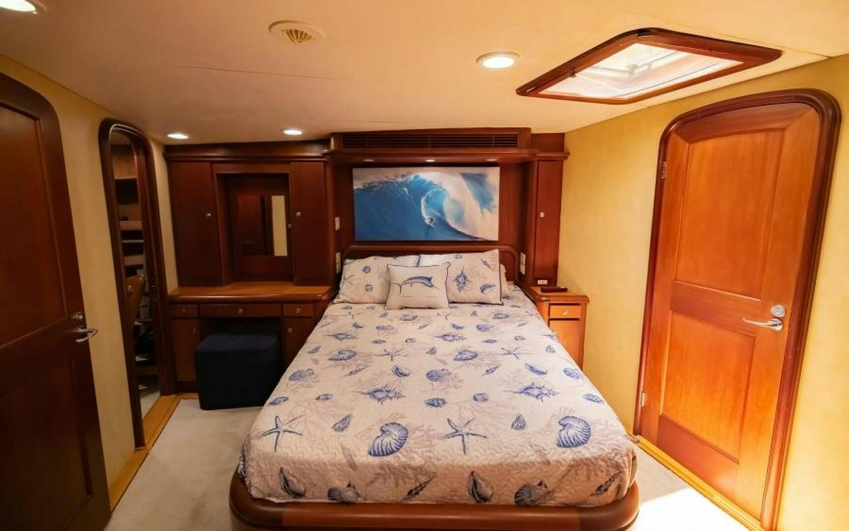 a bed in a room aboard BOOMER Yacht for Sale