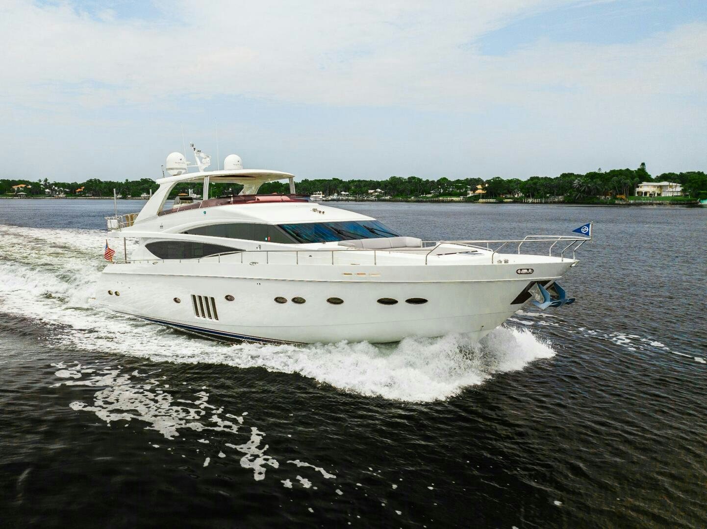 a boat splashing in the water aboard NO CURFEW Yacht for Sale