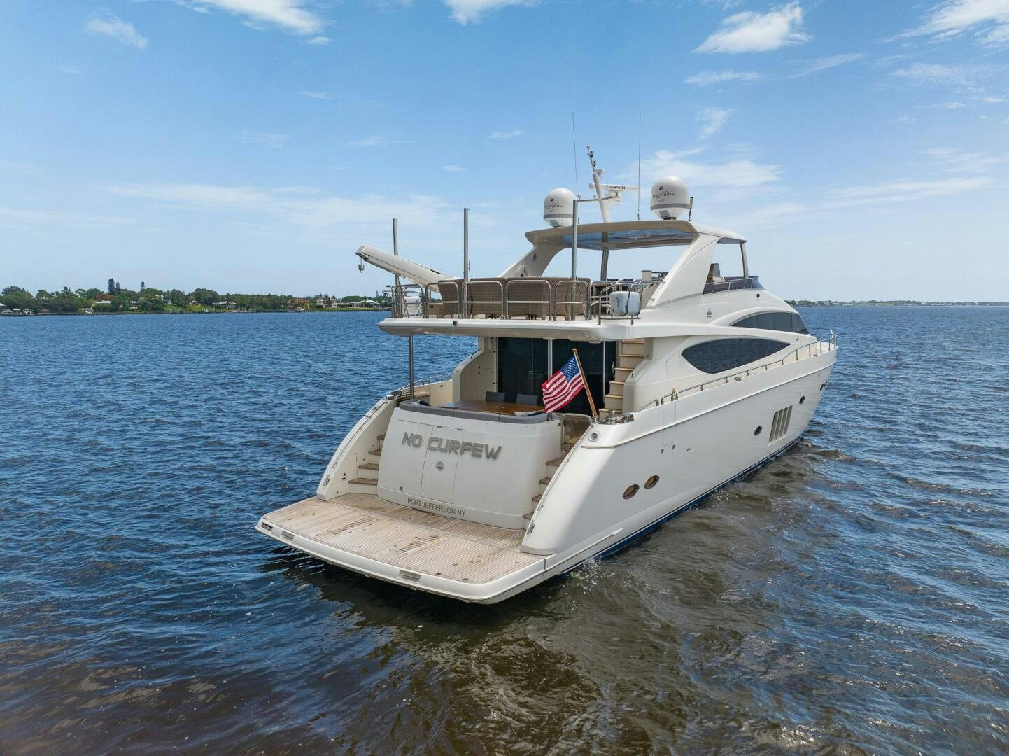 a boat on the water aboard NO CURFEW Yacht for Sale