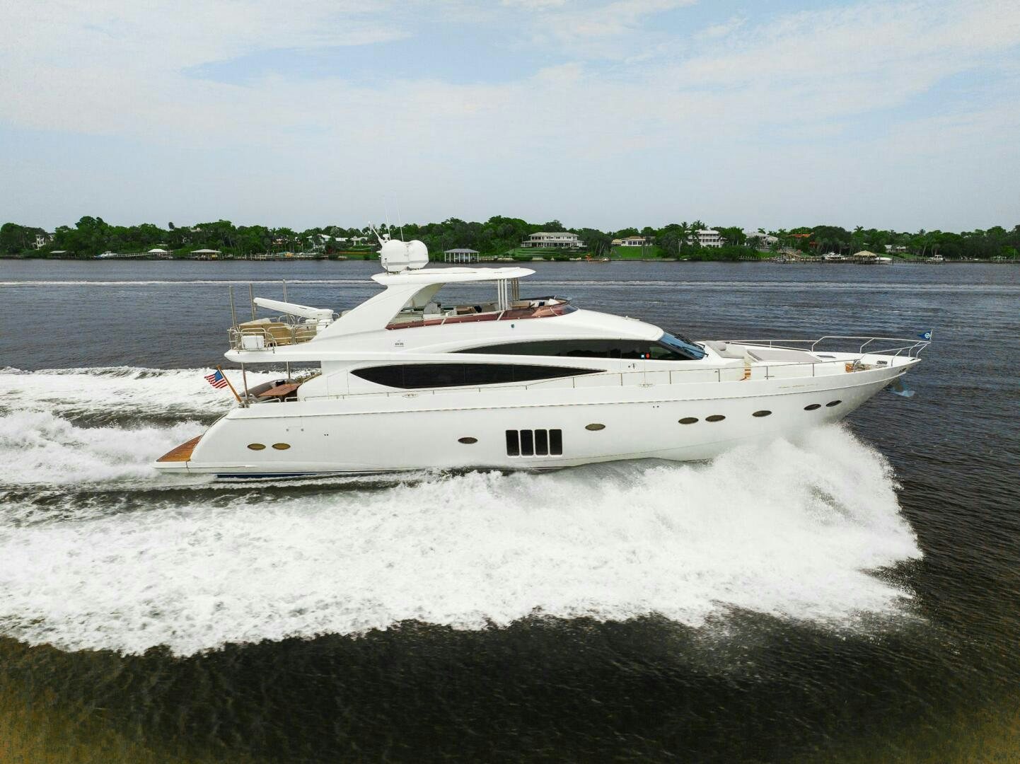 a boat on the water aboard NO CURFEW Yacht for Sale