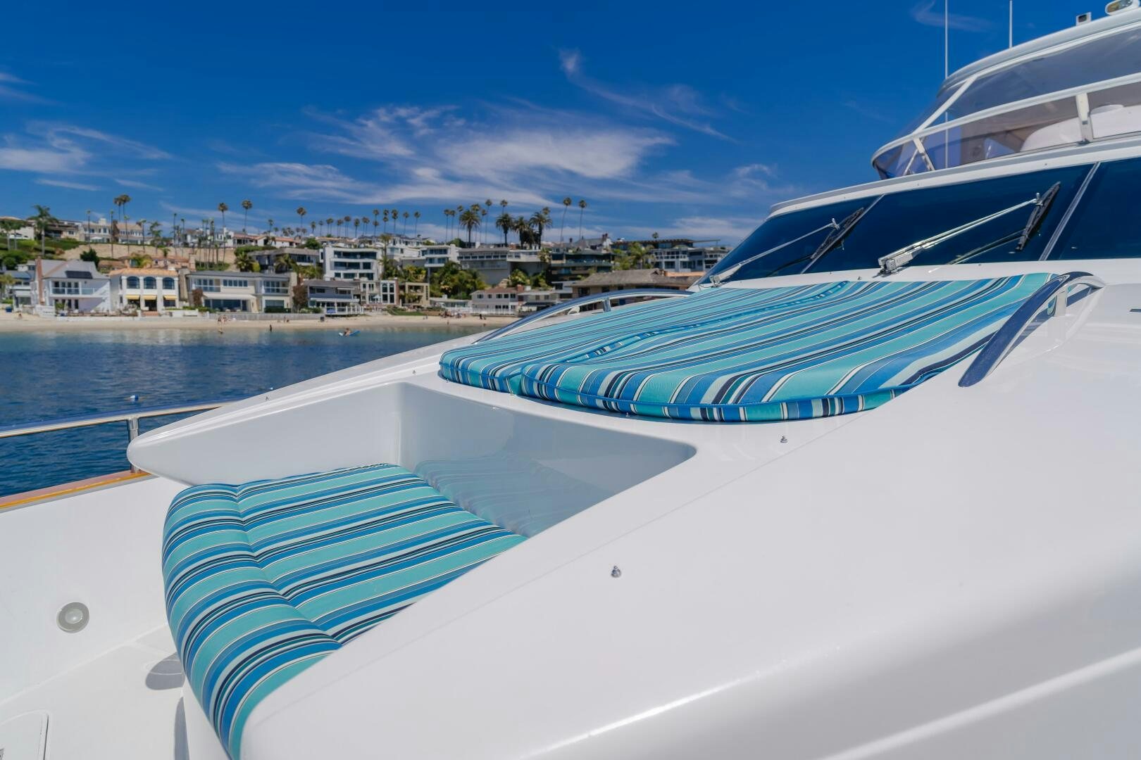 a row of boats on a beach aboard LADY LAURA Yacht for Sale