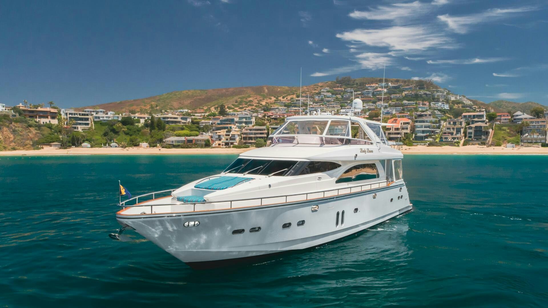 a white yacht in the water aboard LADY LAURA Yacht for Sale