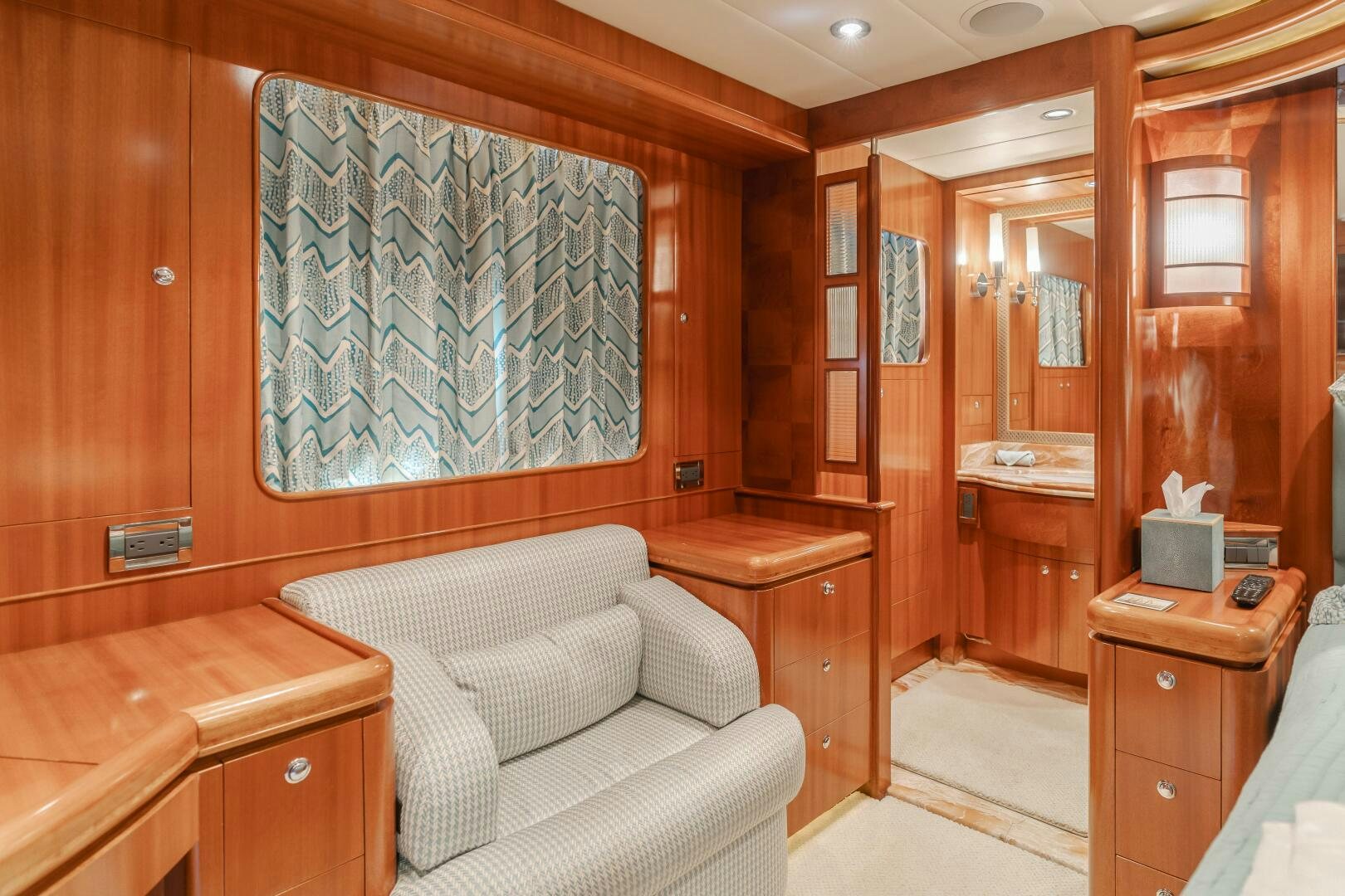 a room with a couch and a table aboard LADY LAURA Yacht for Sale