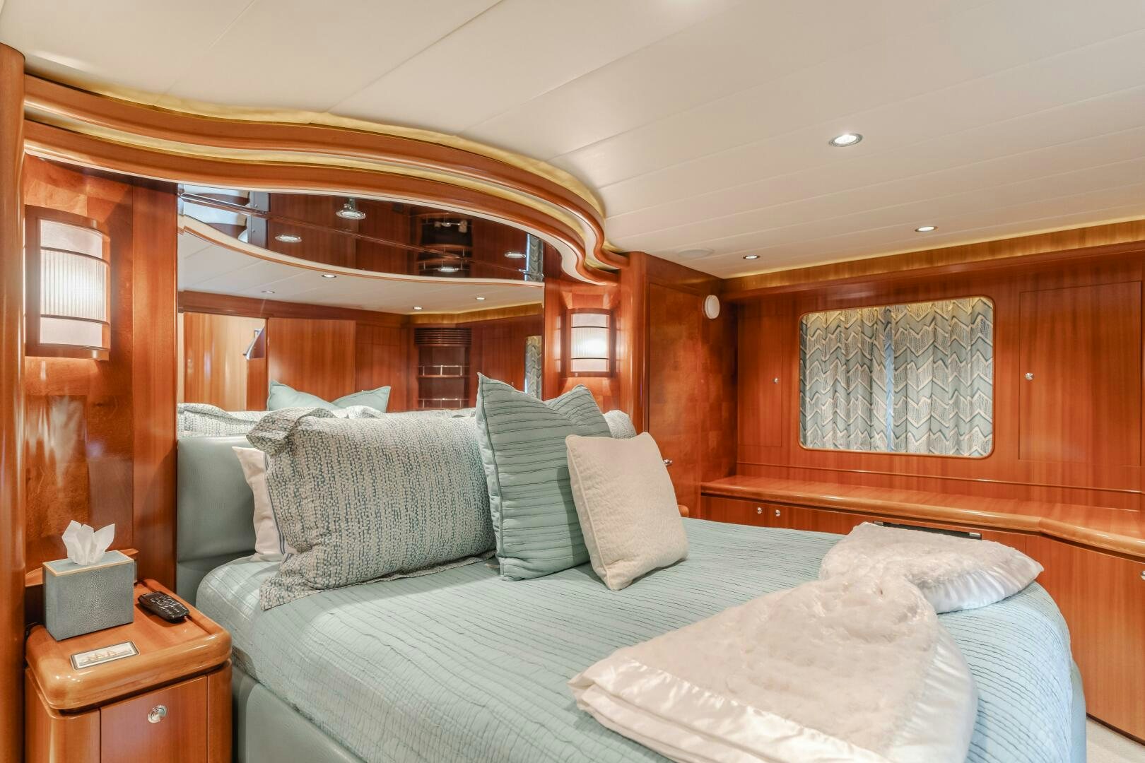 a bed with pillows and a pillow aboard LADY LAURA Yacht for Sale