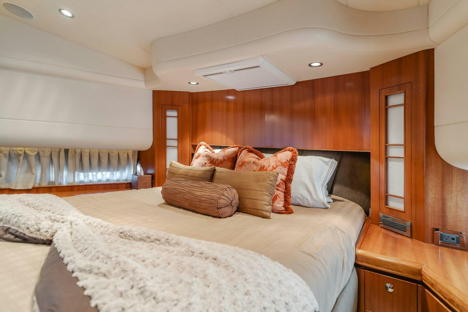 a bed with pillows aboard LADY LAURA Yacht for Sale