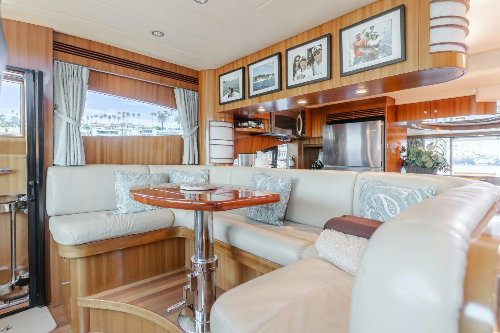 a living room with a couch and a table aboard LADY LAURA Yacht for Sale