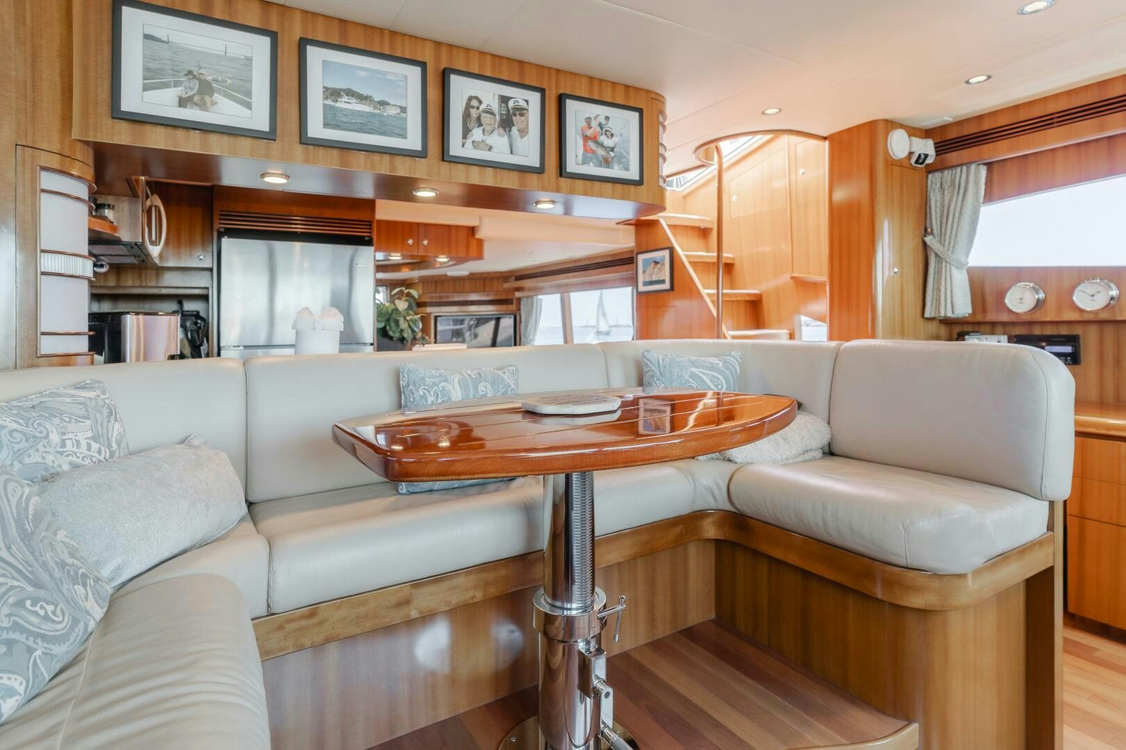 a living room with a couch and a table aboard LADY LAURA Yacht for Sale
