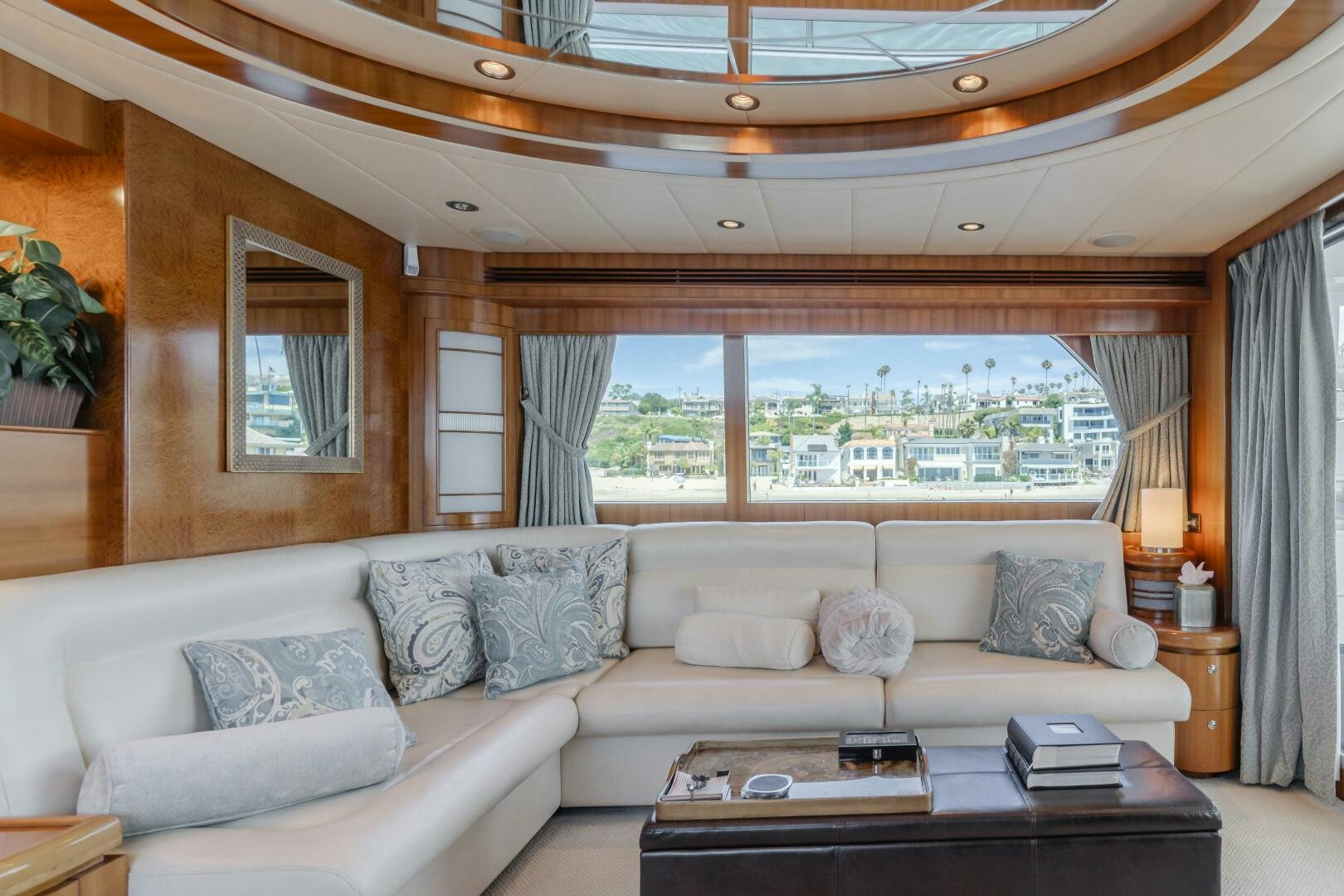 a living room with a large window aboard LADY LAURA Yacht for Sale